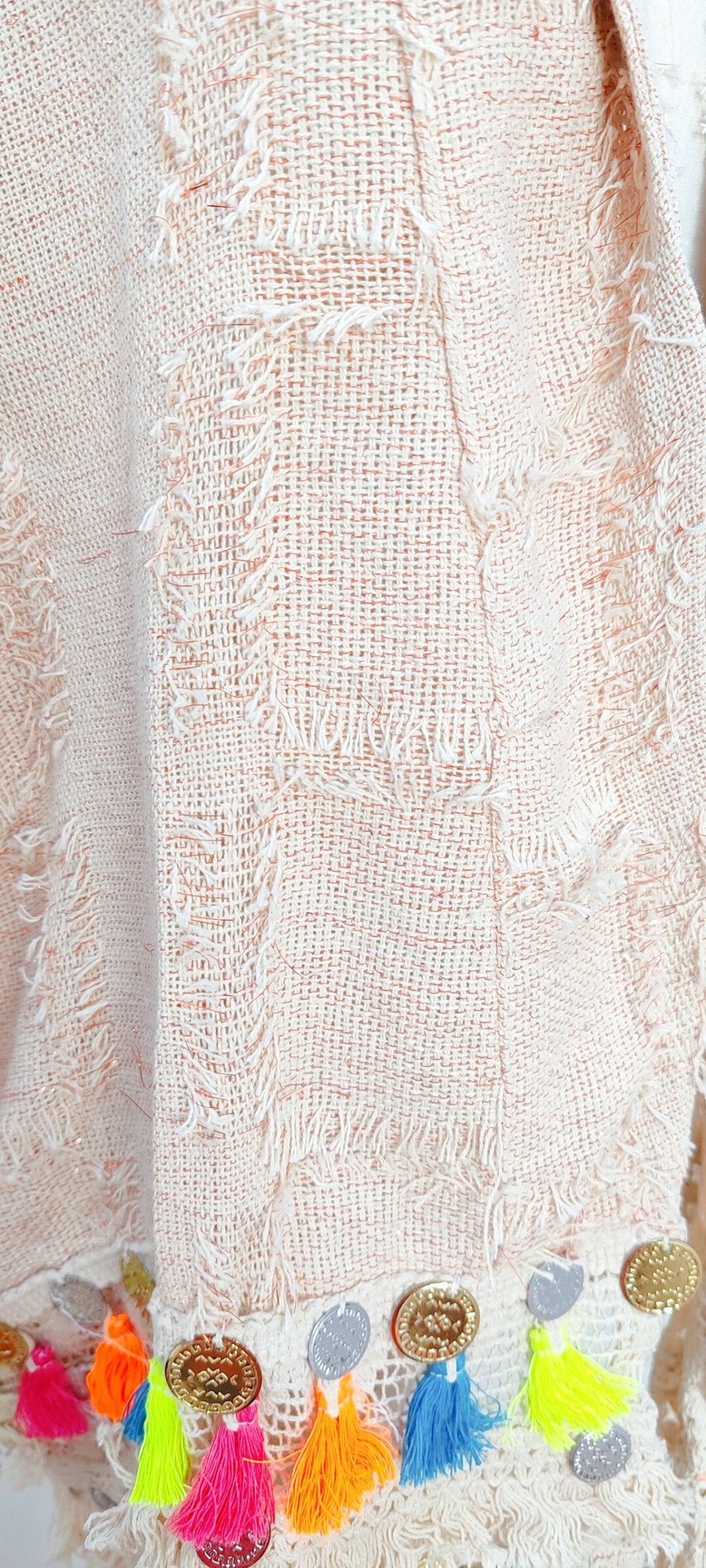Light colored tassel jacket