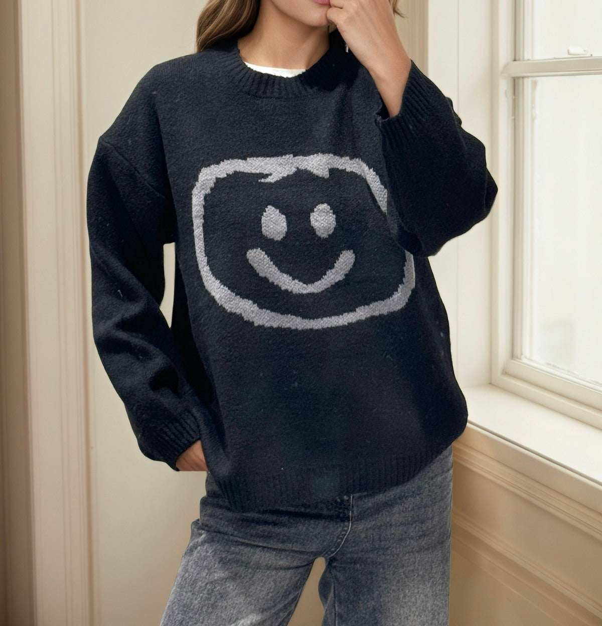 Black wool sweatshirt with smiley face outline in grey 